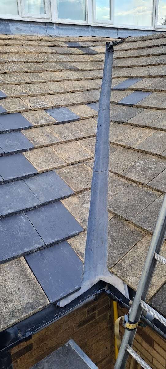 Lead hip on slate roof, by Pro Roofing