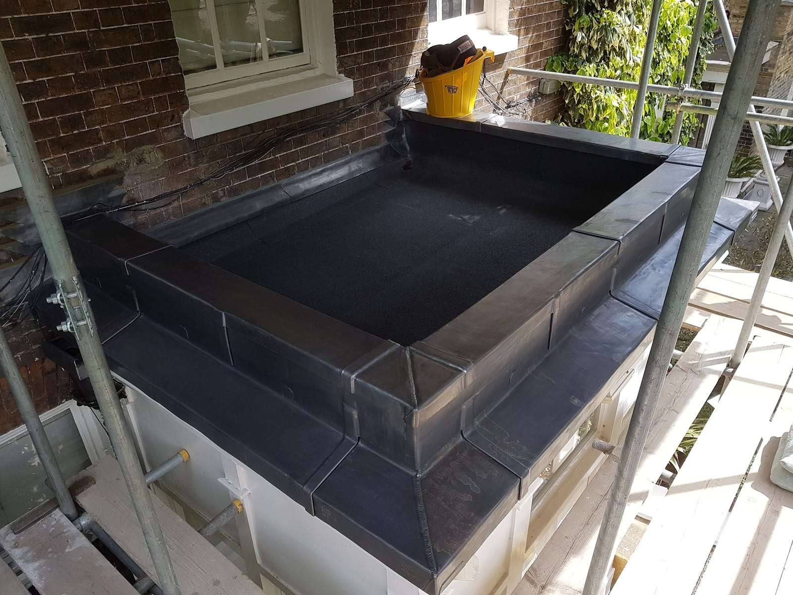 Felt bay roof with slate edging, by Pro Roofing